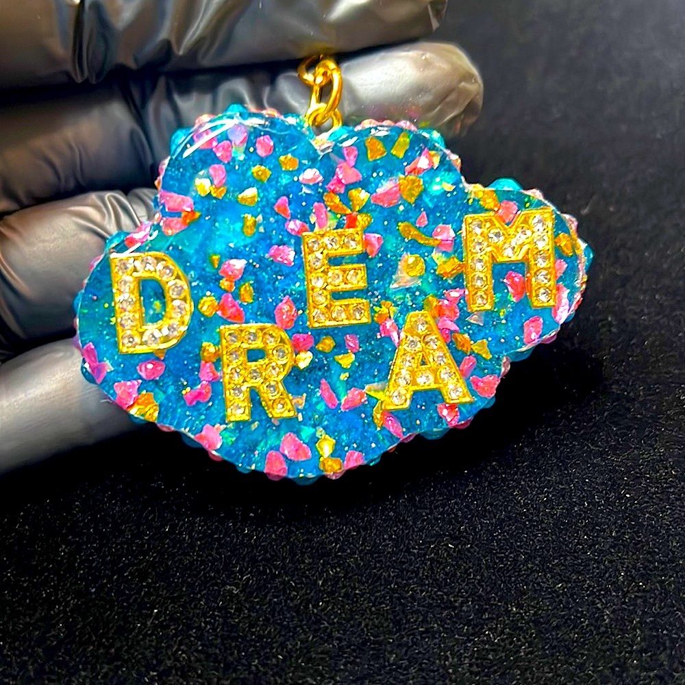 Resin keychain. Rhinestone letters, pink & gold crushed glass & rhinestone trim!